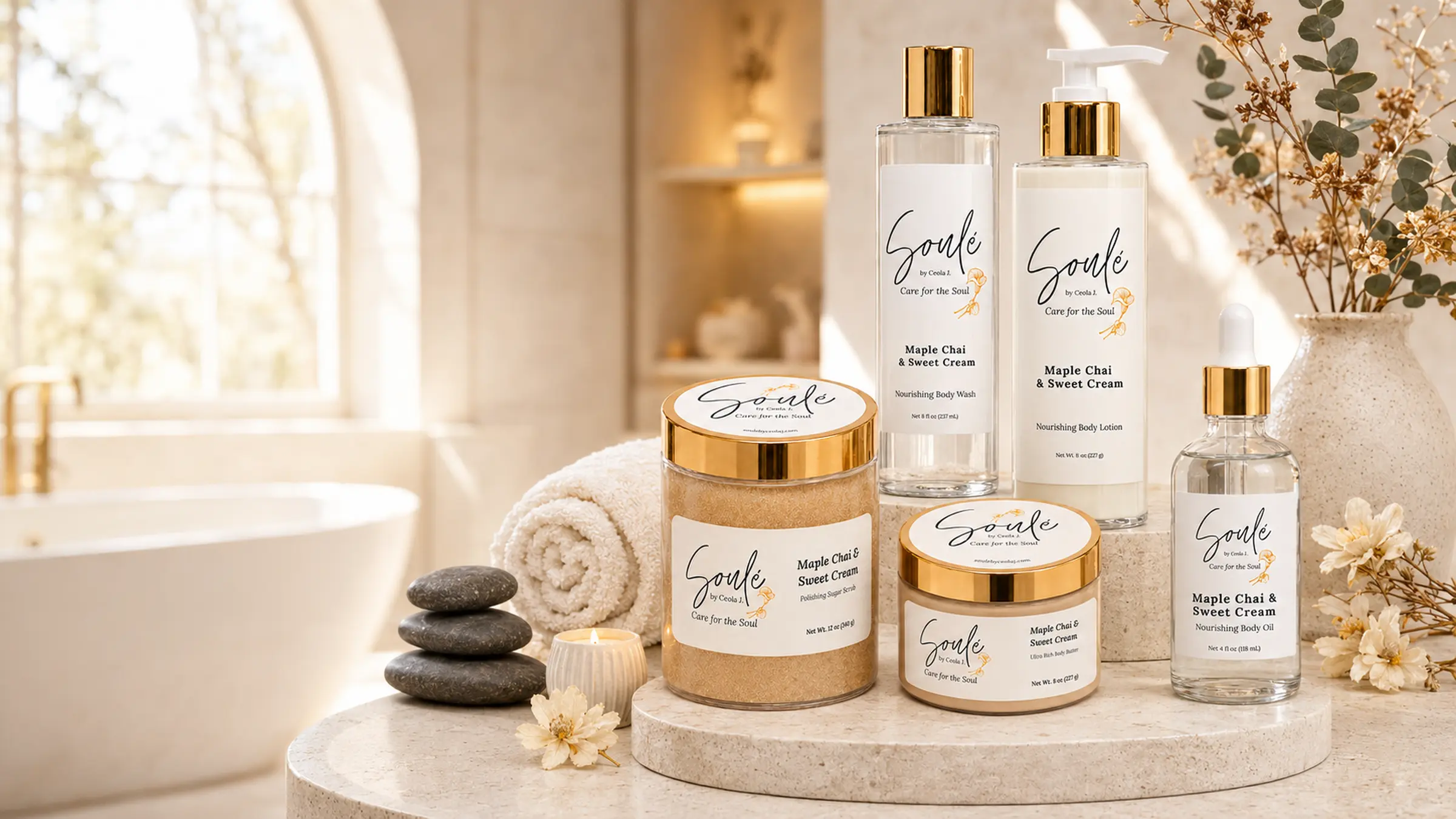 Soulé Maple Chai & Sweet Cream body care line styled in a home spa bathroom